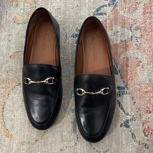 Black leather coach loafers